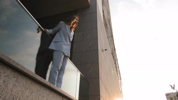 Young Depressed Caucasian Stressed Girl Desperate Woman Standing Alone on Height High Balcony Edge