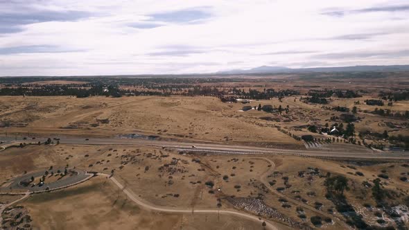 Aerial view of suburban open space park in snowless Winter