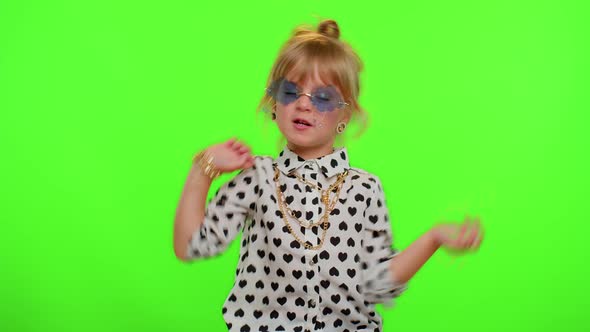 Little Teen Kid Child Girl in Stylish Sunglasses Listening Music Dancing Disco Fooling Having Fun