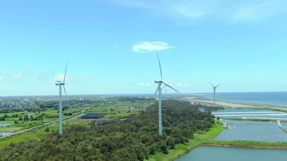 The wind turbine is located by the sea