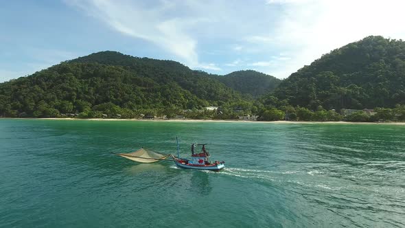 Aerial view of boat navigating near the coast, Ko Chang, Thailand.