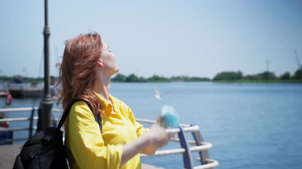 Young Cheerful Girl Takes Off Her Medical Mask To Protect Herself From Virus and Infection and