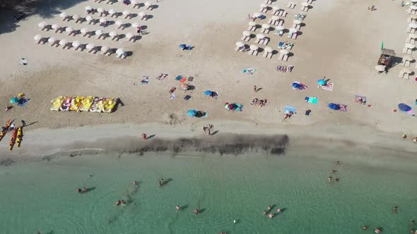 Aerial footage of the Spanish island of Ibiza showing the beautiful beach front and hotels