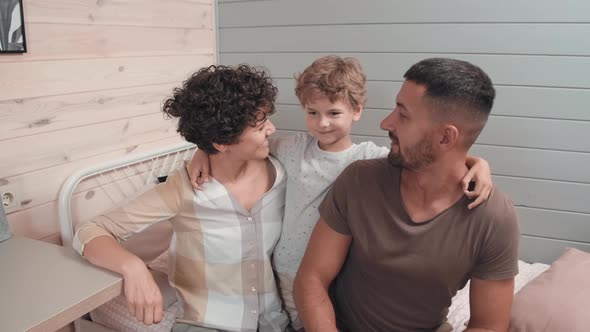 Portrait of Parents and Cute Boy in Sleepwear