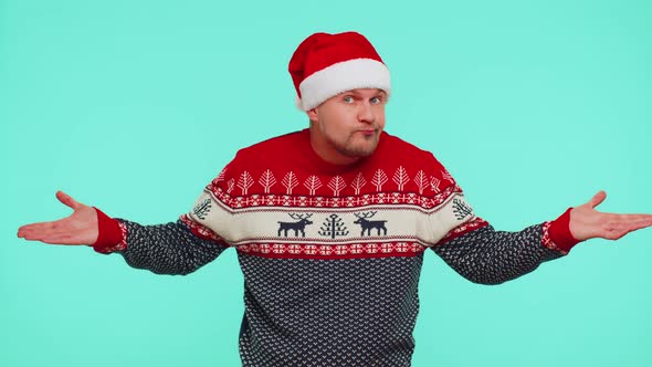 Confused Man in Christmas Sweater Feeling Embarrassed About Ambiguous Question Having Doubts No Idea