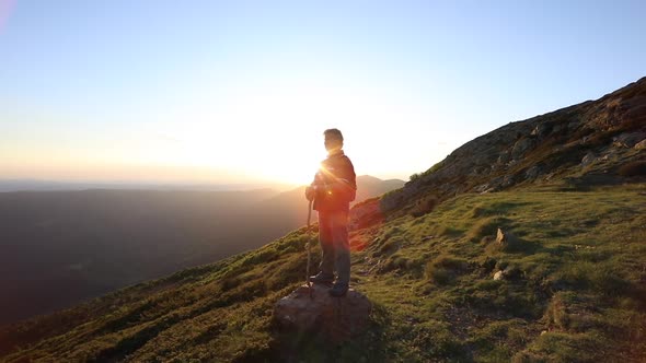 Senior man contemplating the sunset