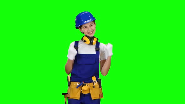 Builder Is Satisfied with the Finished Object . Green Screen