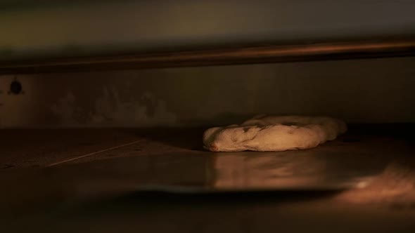 Hot Pizza Is Baked In Hearth