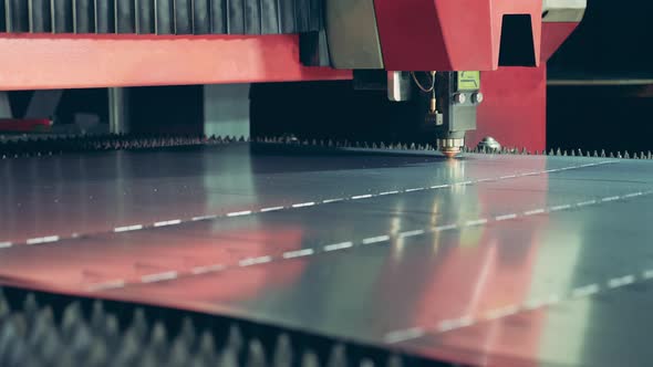 Cuts Are Being Made on the Metal Material By the Laser Machine. Laser Cutting Machine Processing