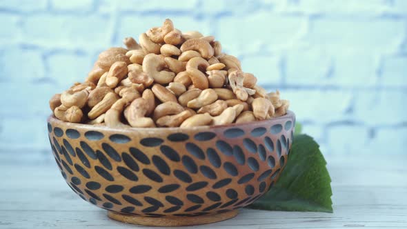 Cashew Nuts in a Wooden Bowl on Table