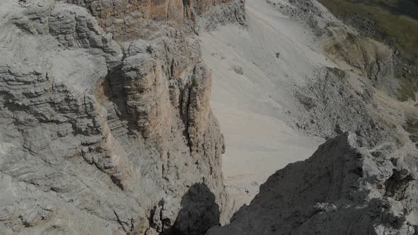 Barren eroded high mountain top, hostile highland aerial view, Italian Dolomites