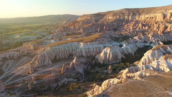 Hoodoos, Fairy Chimneys, Sedimentary Volcanic Rock Formations in Morning Sunrise, Cappadocia Turkey