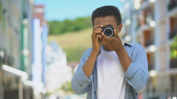 Young Teen With Camera Making Photos Outdoor and Smiling, Hobby and Rest
