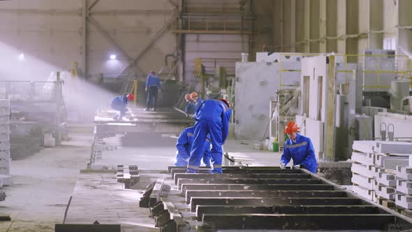 Workers doing their job at cement factory