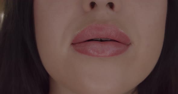 Extreme Close Up of Woman's Sexy Lips with Botox