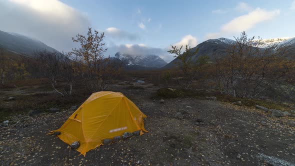 Tent and Clouds in Autumn Morning in Khibiny Mountains