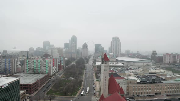 Scene of downtown St. Louis on foggy day. Aerial dolly right to left