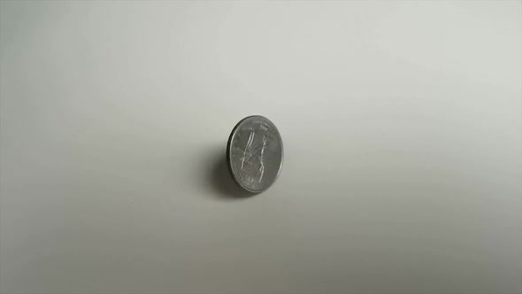 Quarter Dollar 25 Cent Coin Rotating Over White Background 1000 Fps Super Slow Motion Video