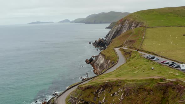 Aerial Footage of Car Park and People at Tourist Attraction on Sea Coast