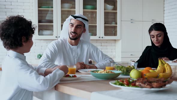 arabian family spending time together at home