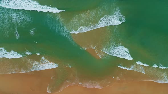 Phuket sea beautiful waves crashing on beach Aerial view