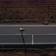 Aerial Drone Shot of Man Ride Longboard on Road - VideoHive Item for Sale