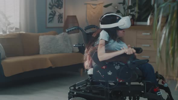 Woman in Motorized Wheelchair Wearing VR Glasses