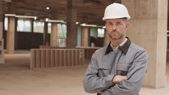Blue-eyed Construction Worker Posing