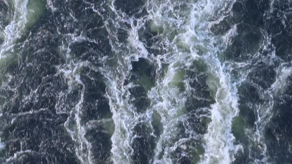 Back View of the Sea Washing From a Cruise Ship