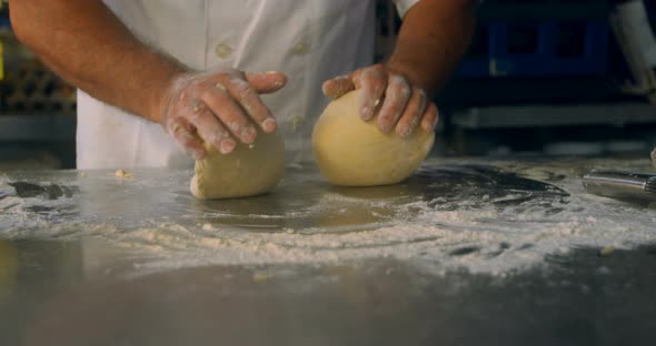 Male Chef Kneading Flour in Kitchen 4k