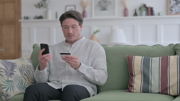 Man making Online Payment on Smartphone