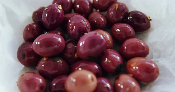 Red olive tapas in a bowl