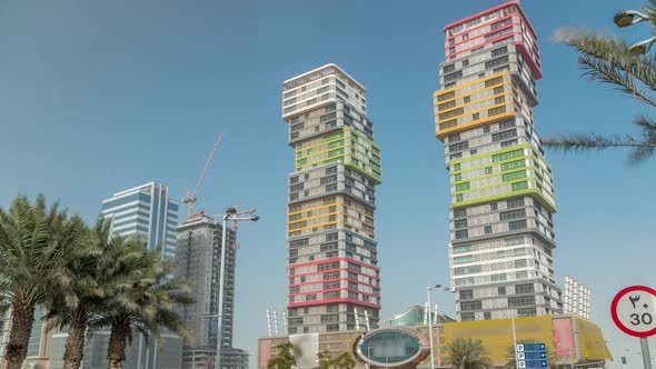 Doha Skyline Timelapse with Colorful Al Marina Twin Towers Building Located the