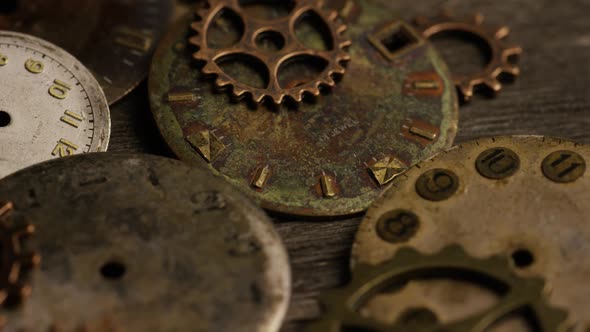Rotating stock footage shot of antique and weathered watch faces - WATCH FACES 113