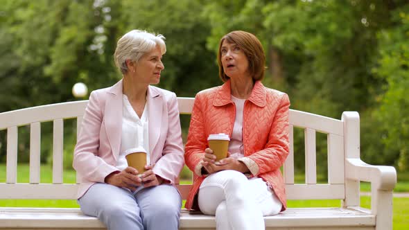 Senior Women or Friends Drinking Coffee at Park