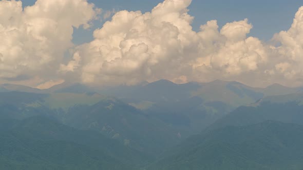 Caucasus Mountains landscape timelapse moving clouds. View from Telavi, Georgia