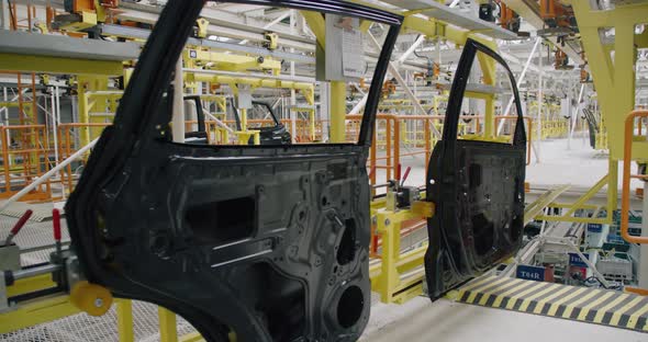 Automobile Plant, Modern Production of Cars, Transportation of Ready Car Doors on the Production