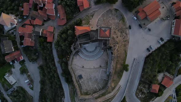 Drone lowers down over Belmont Castle in a birds-eye view.