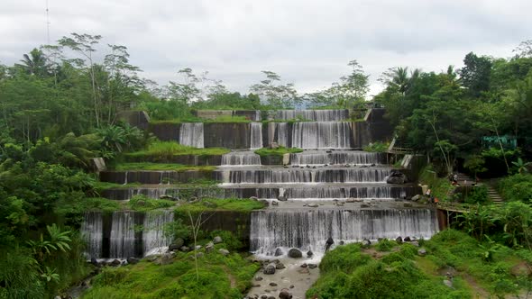 Aerial flyback at Watu Purbo waterfall in Muntilan, Indonesia