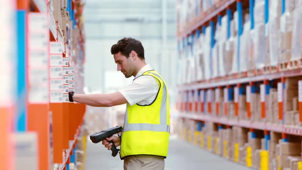 Warehouse Worker Scanning a Boxes