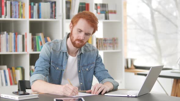 Casual Redhead Man Writing Letter