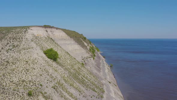 Steep Bank of the River From a Bird's Eye View. Bank of the Volga River in Russia. Aero 