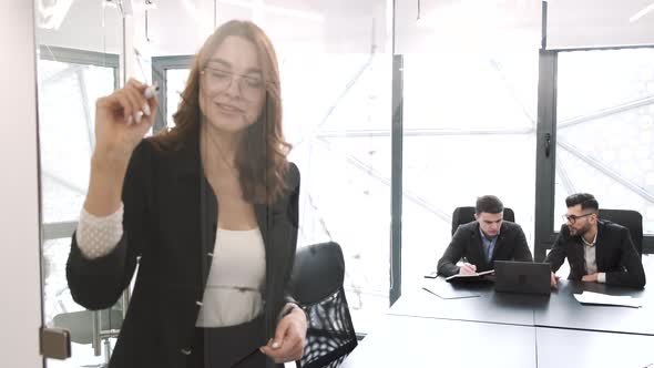 Young Pretty Smart Woman Working at Office