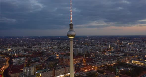 AERIAL: Day To Night Hyperlapse, Motion Time Lapse of Berlin with Alexanderplatz TV Tower View and