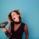 Brunette Model Sings Into Hairdryer - VideoHive Item for Sale