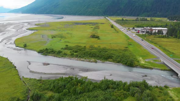 4K Cinematic Drone Video (dolly forward) of Seward Highway Alaska Route 1 over Glacier Creek with Gi