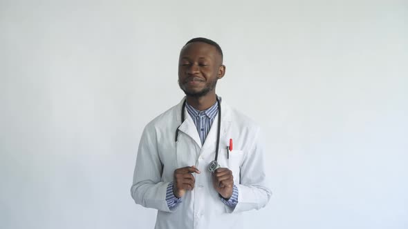 Young African Doctor Happy with the Result White Background