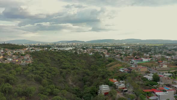 Complex of houses outside the city cerro occidente cloudy sky urban forest