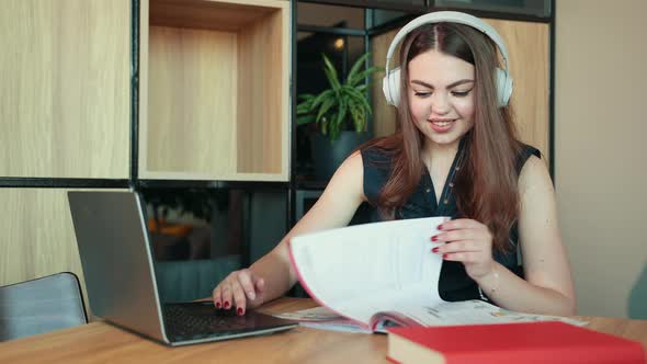 Young Woman Having Video Call on Laptop Computer at Home