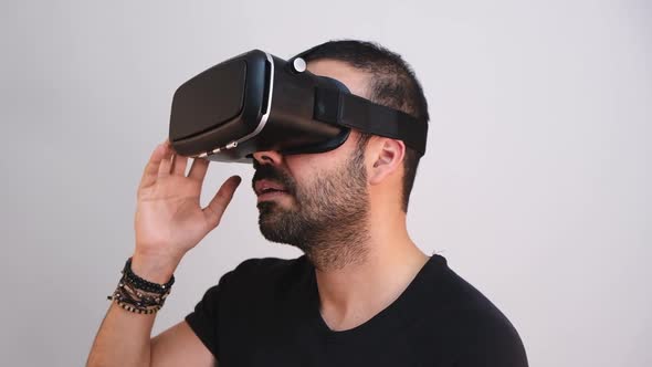 Young Man in VR Glasses Headset Gesturing Portrait